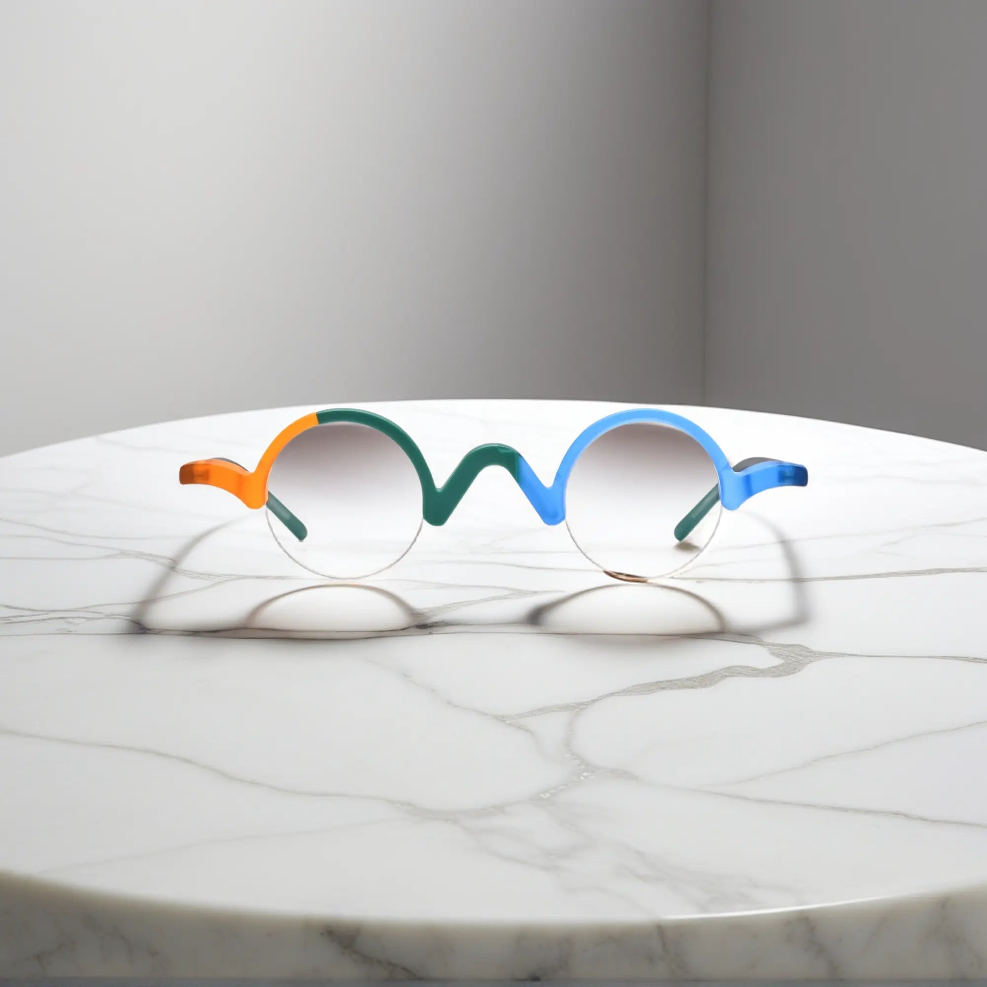 Front display of VoyueLens™ Teal-Blue semi-rimless browline eyeglasses with striking wave-inspired browline.